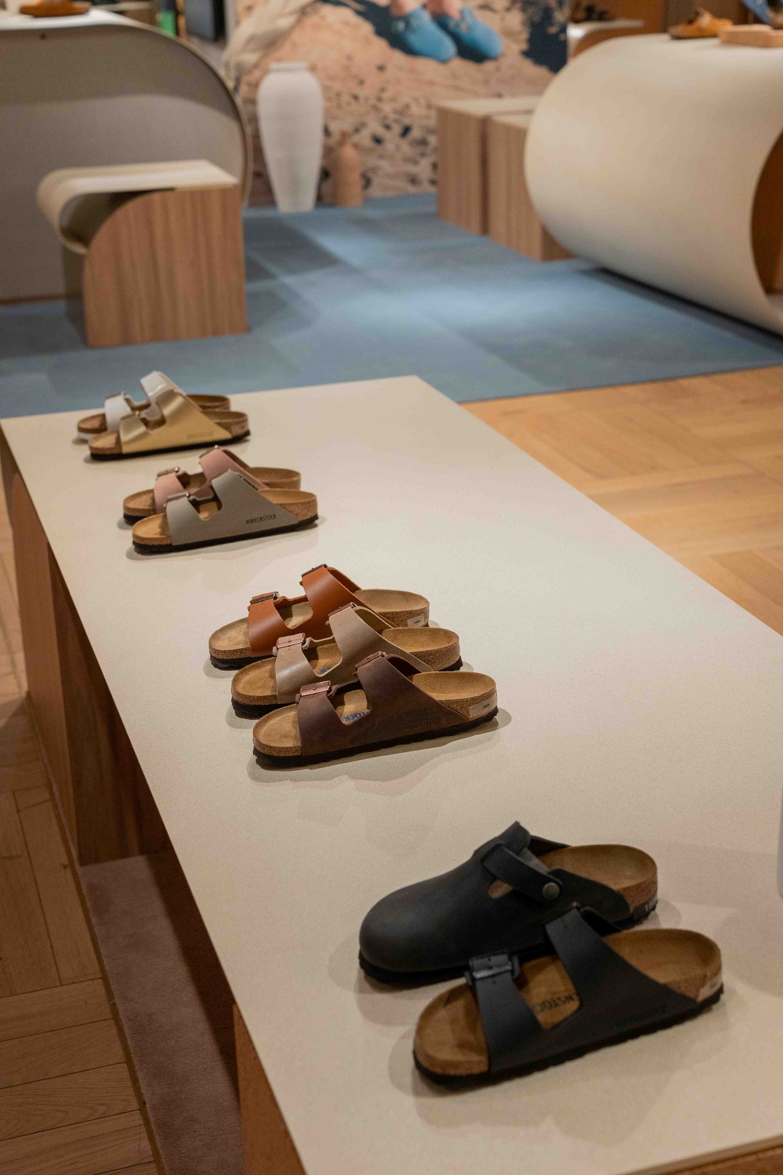 Birkenstock corner at Galeries Lafayette Haussmann, sandals lined up on the table top