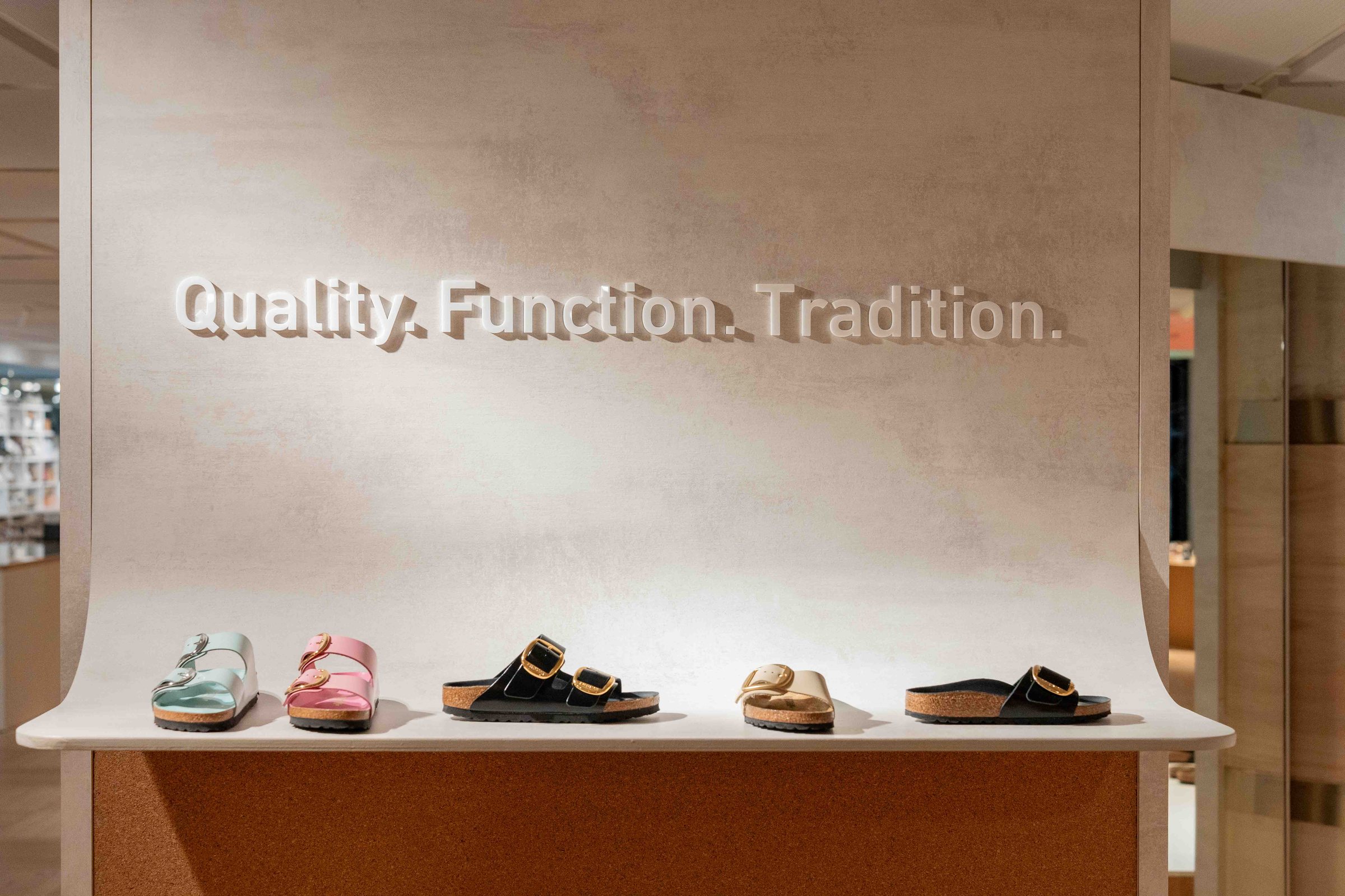 Birkenstock corner at Galeries Lafayette Haussmann, "Quality. Function. Tradition." shelf