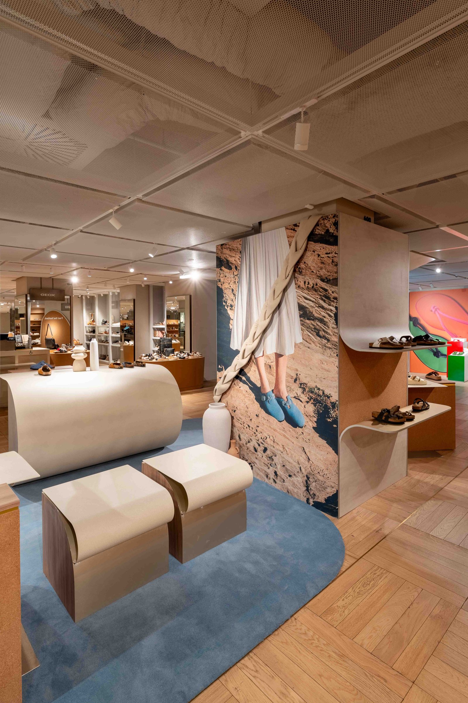 Birkenstock corner at Galeries Lafayette Haussmann, curved furniture and campaign visual